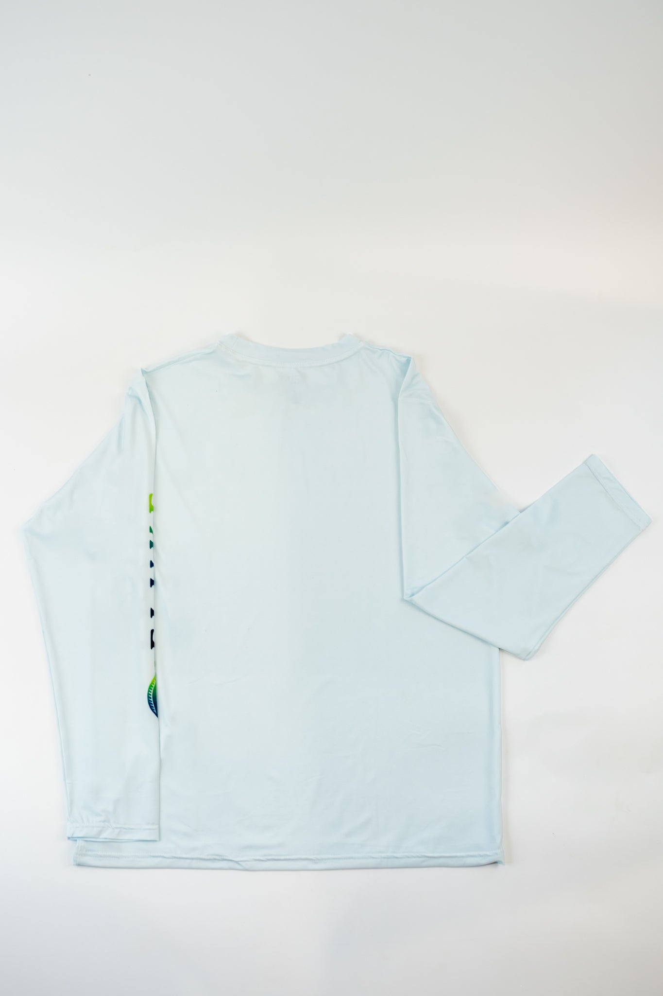 Light blue long-sleeve shirt on a white background