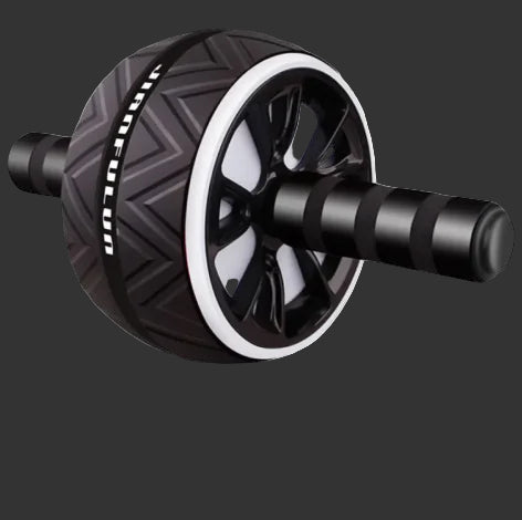 Black ab roller with a free kneeling pad on a gray background