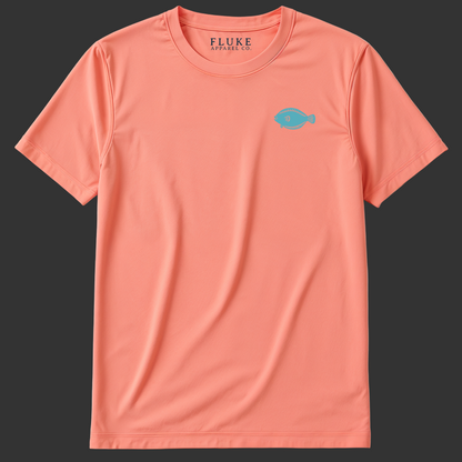 Coral t-shirt with a small blue fish logo on a white background