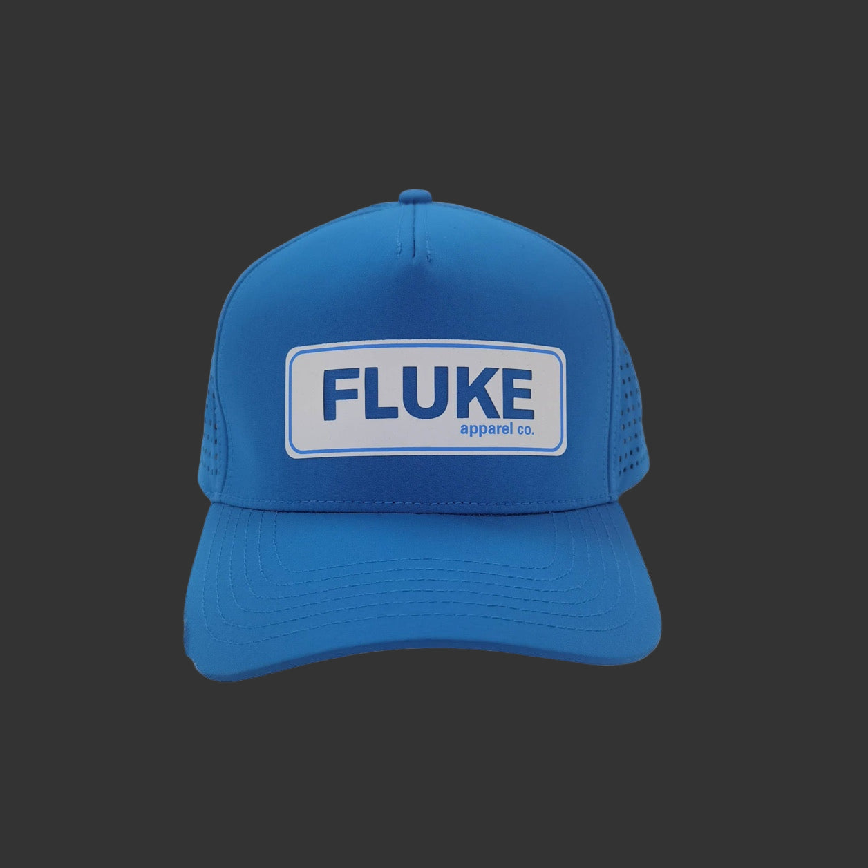 Blue cap with 'Fluke' logo on a gray background