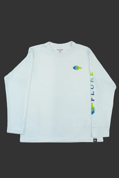 Light blue long-sleeve shirt with graphic design on a grey