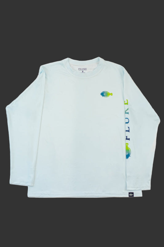 Light blue long-sleeve shirt with graphic design on a grey