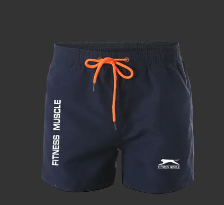 Navy blue shorts with orange drawstring and 'Fitness Muscle' branding on a gray background