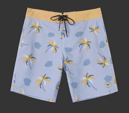 Blue board shorts with palm tree and shell pattern on a Gray background