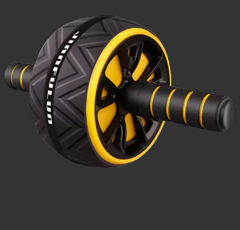 Black and yellow ab roller with a free kneeling pad on a gray background