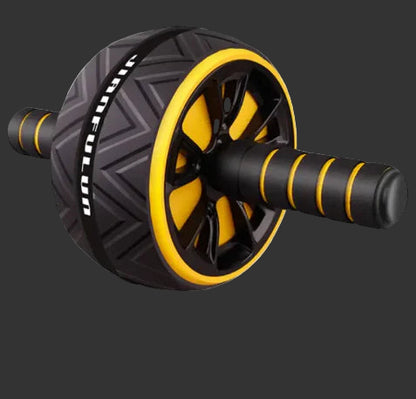 Black and yellow ab roller with a free kneeling pad on a gray background